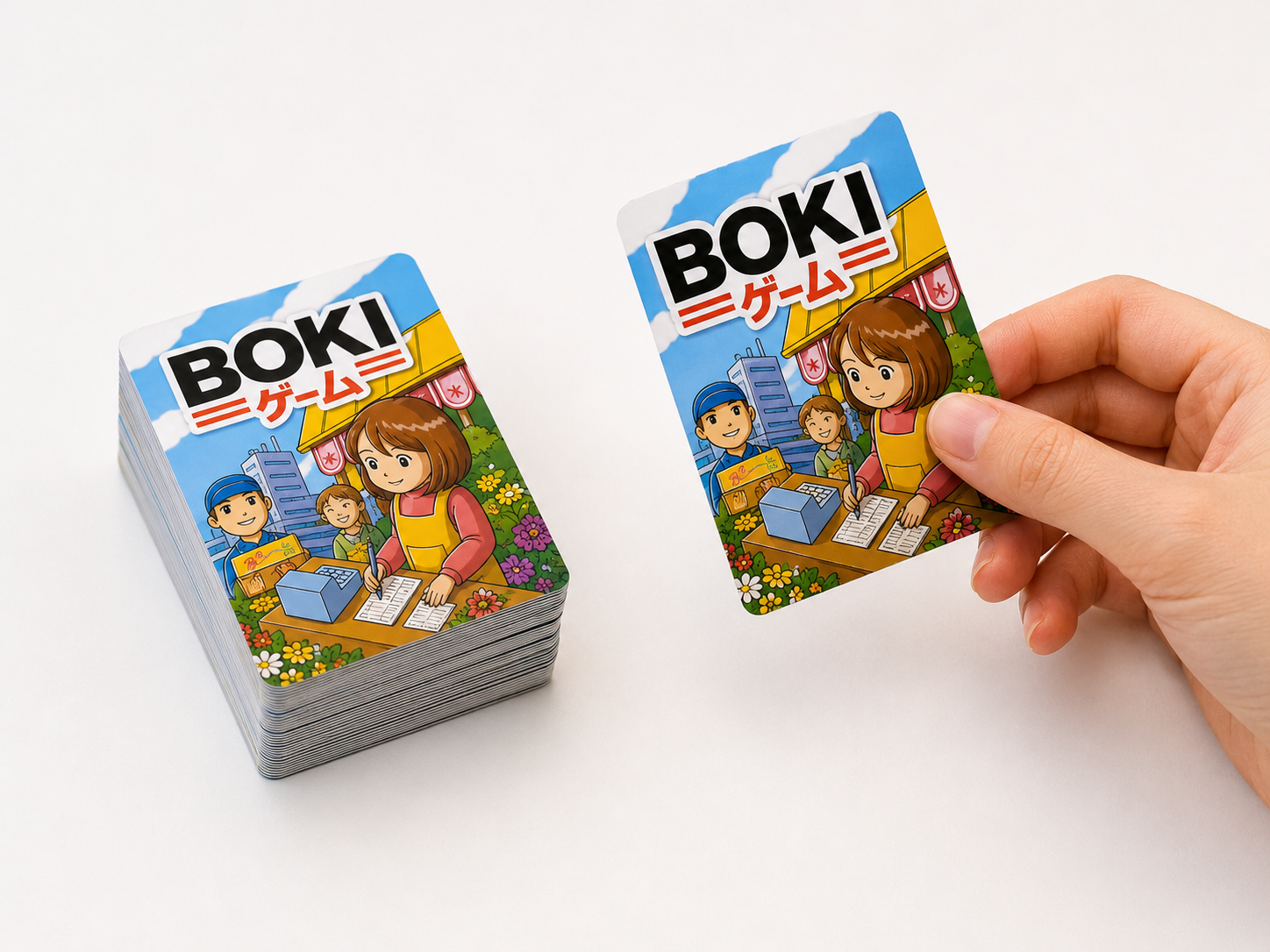 カードをめくって商売を体験している様子
